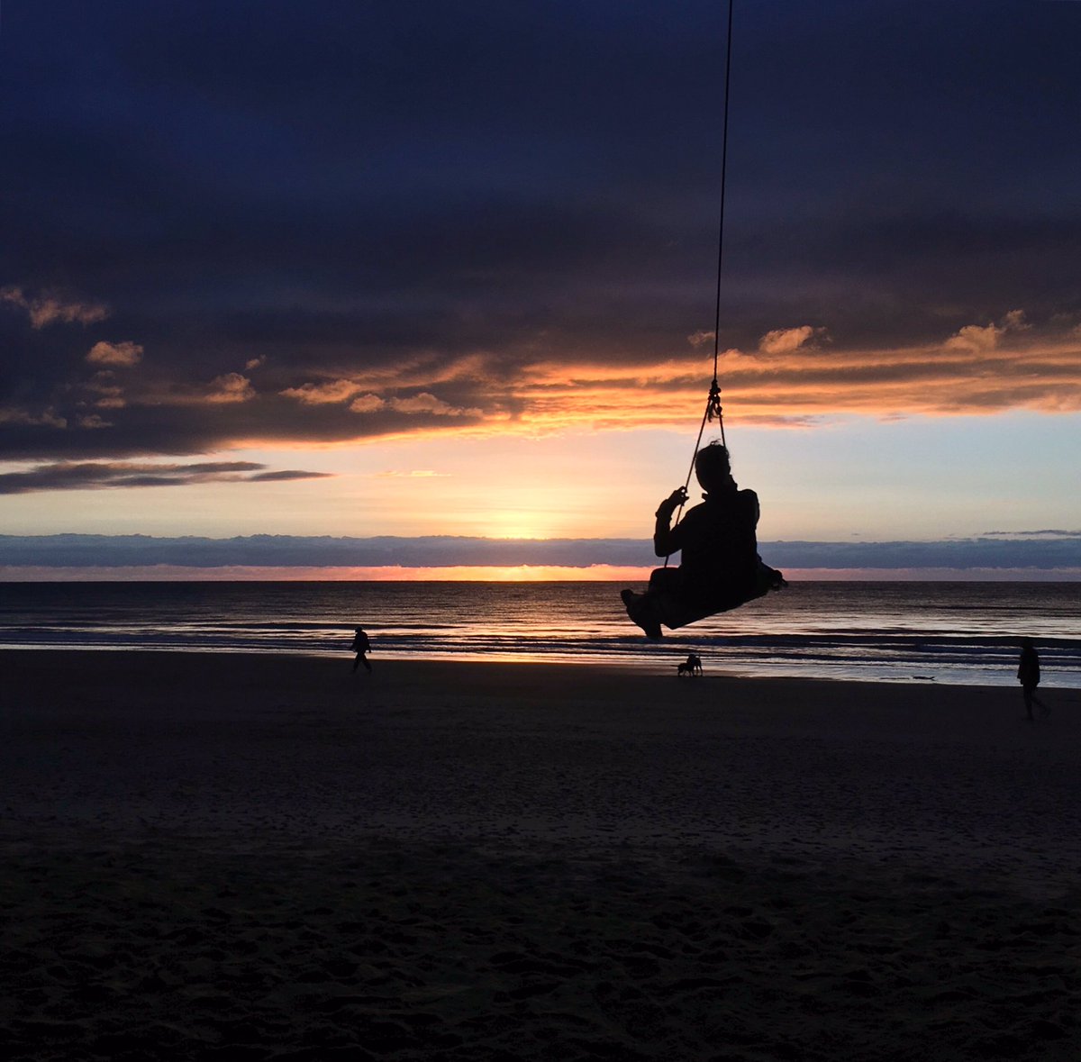Swinging into the sunrise. Daintree, Australia.