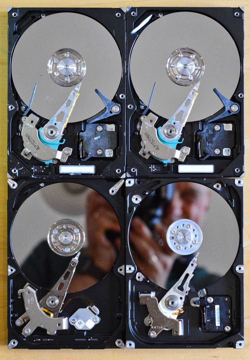 PeterGC15's tweet photo. Reflected Memories. 4 computer hard drives with the tops off provide a novel mirror. #computers #data #mirror #mirrorselfie #reflections https://t.co/C734OZziDb