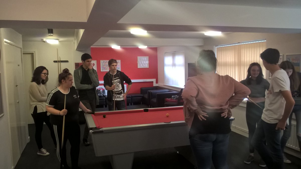 NCS_Team24's tweet photo. Team 24 in a power meeting (President Trump is on Skype) and then letting off some post-meeting steam on the pool table @NCSCheshireWest https://t.co/sTmxVPMrfE
