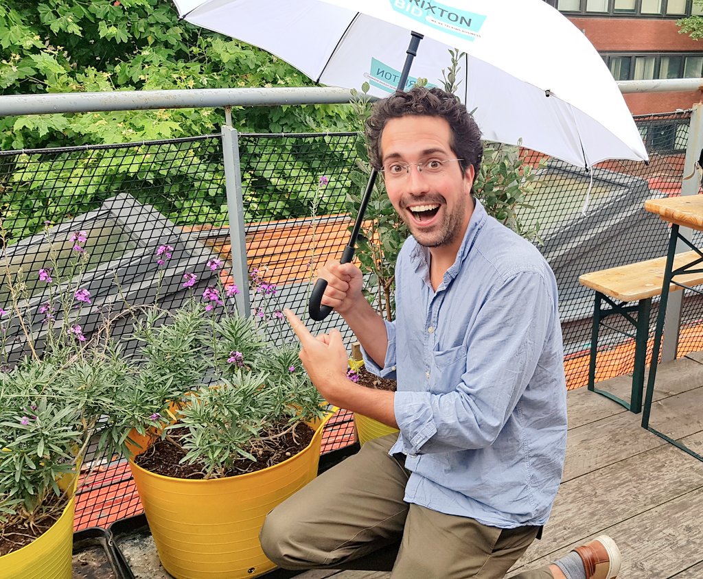BrixtonBID's tweet photo. Great meeting our friends from @urbangrowthlg to discuss the #BrixtonOrchard - here's Bruno of Urban Growth posing on the office's balcony https://t.co/Yl4GrOVJVZ