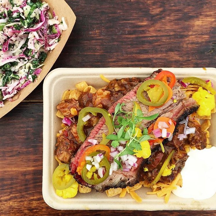 Frito Pie for the win! Made with chili con carne, spicy pickled vegetables &amp; topped with a slice of brisket 🔥 #austin #texas #bbq