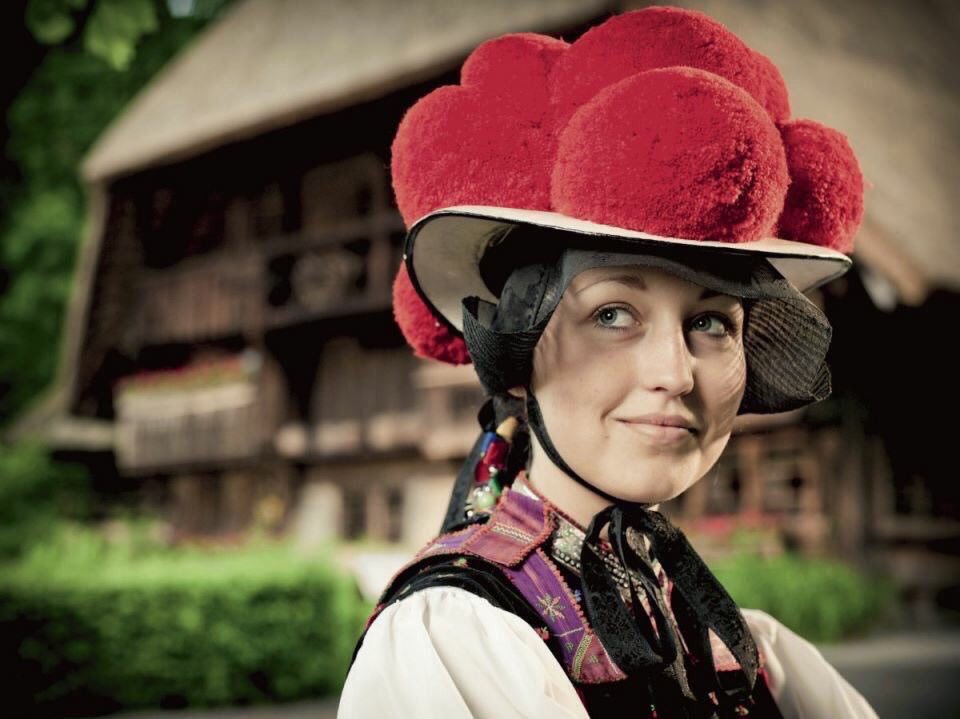 MagicalEurope's tweet photo. The Bollenhut is a women's hat with pom-poms &amp; has been part of the traditional costume of Black Forest villages since the 1700s. #Germany https://t.co/ZziK395jF5