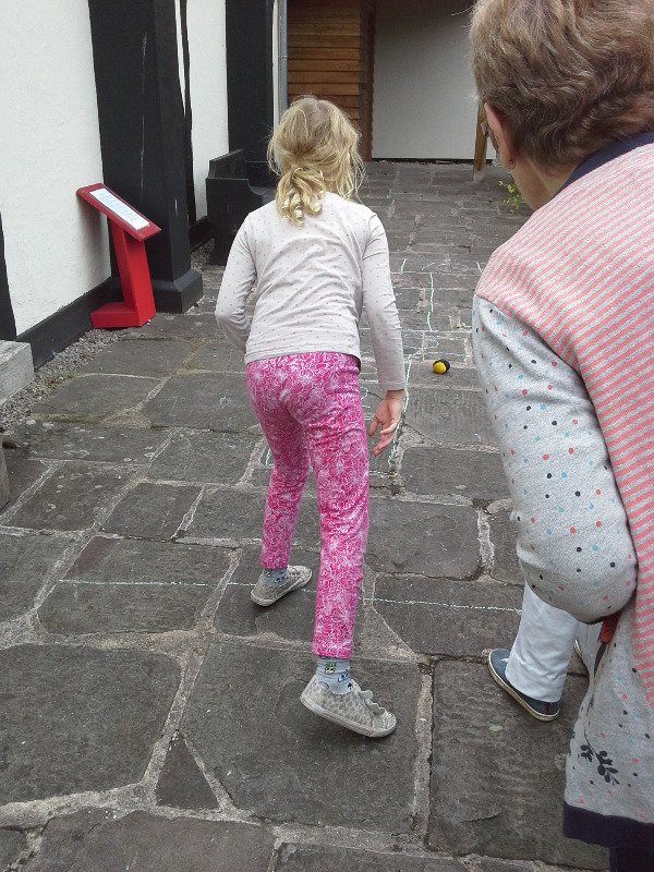 Some of our young visitors enjoying #traditionalgames. #Fun and learning for all in the RedLodge garden. ^am