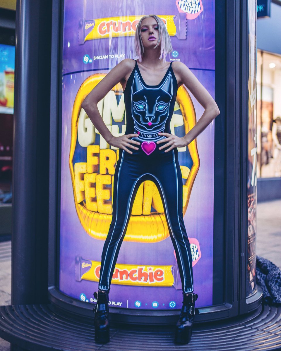 Feline Fatale <a href="/TealeCoco/">𝐄𝐕𝐈𝐋☽❍☾𝐀𝐍𝐆𝐄𝐋</a> lits #hackney streets in our bodysuit CATWALK 💗 #nympha nympha.co.uk