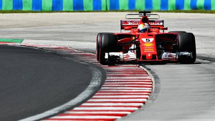 Gazzetta_it's tweet photo. Ungheria, prima fila Ferrari! Pole Vettel, poi Kimi. Bottas e Hamilton 3° e 4° https://t.co/vxLap19vjb #motori #formula1 https://t.co/62AqQeSXG8