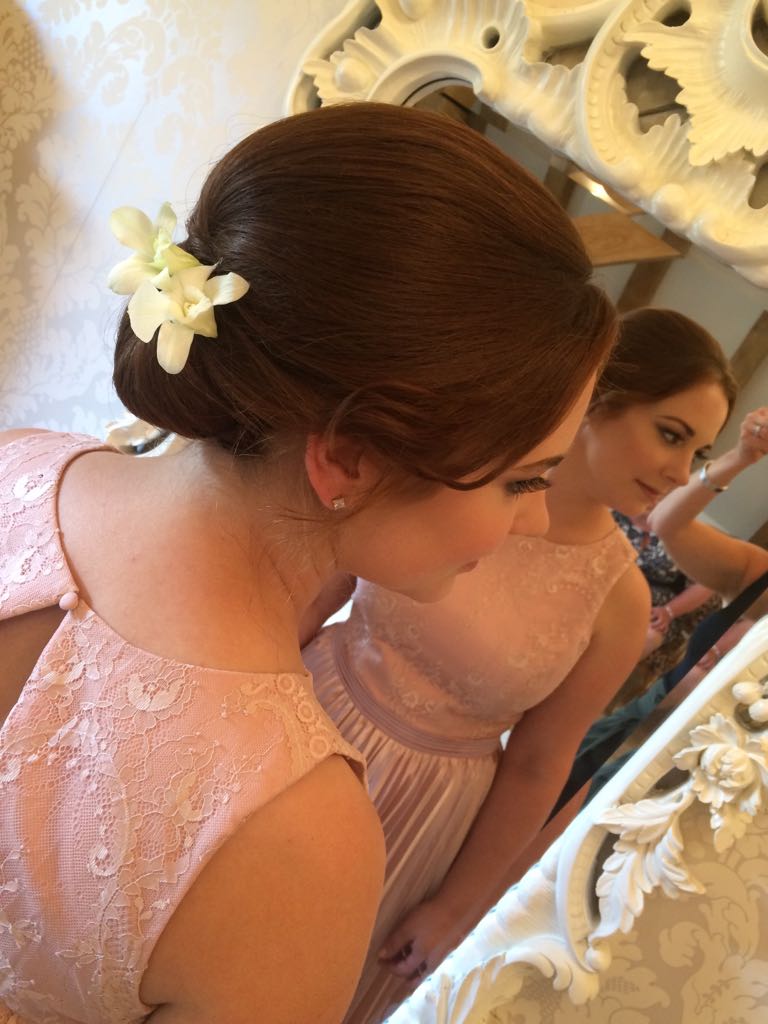 VickiLordHair's tweet photo. Simple #chignons look great with flowers- orchids sit particularly beautifully! The trick is to keep the crown area full but symmetrical :) https://t.co/6gUVfLJZ3E