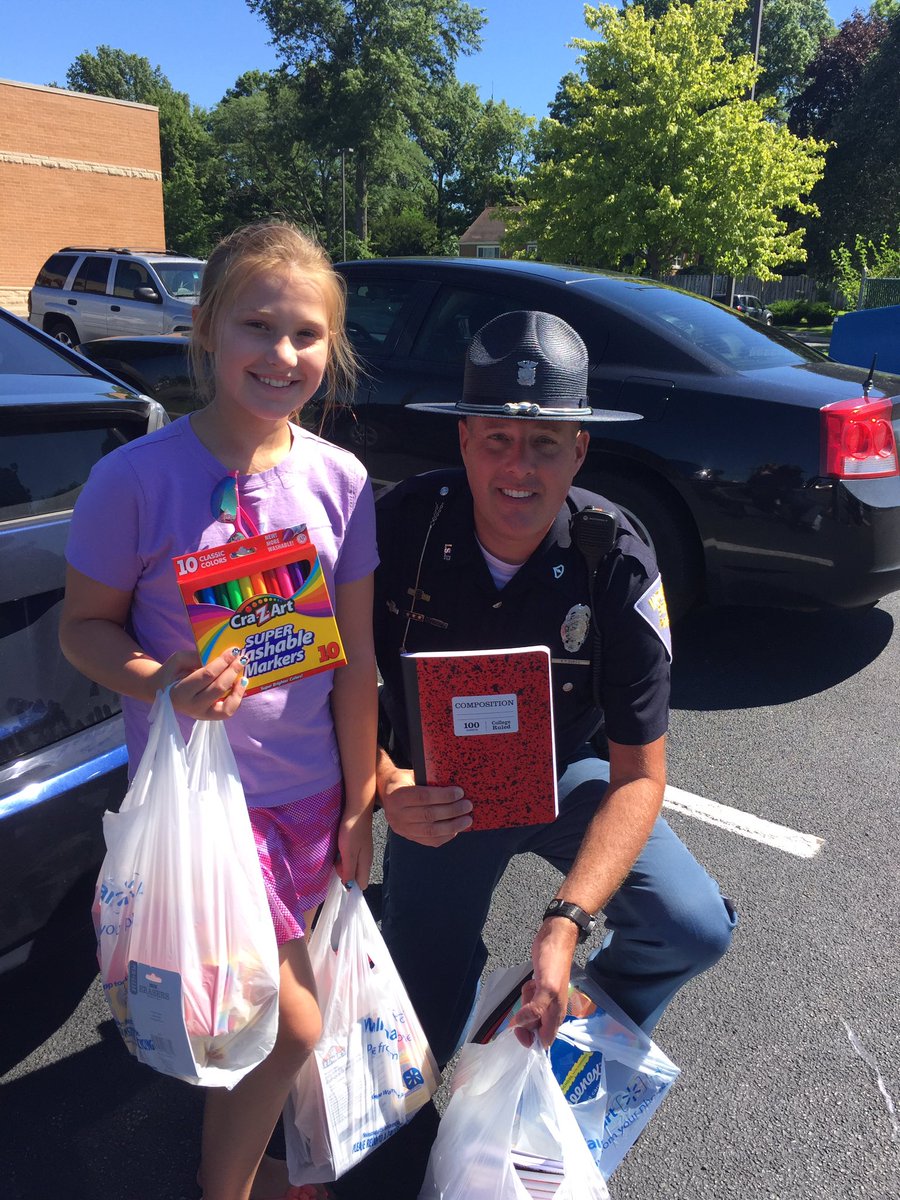 ISPBremen's tweet photo. Trooper Kyle Dukes and a friend at #16PackABackpack in Plymouth. Thanks also to FOP195. https://t.co/NTZJ2CkUWD