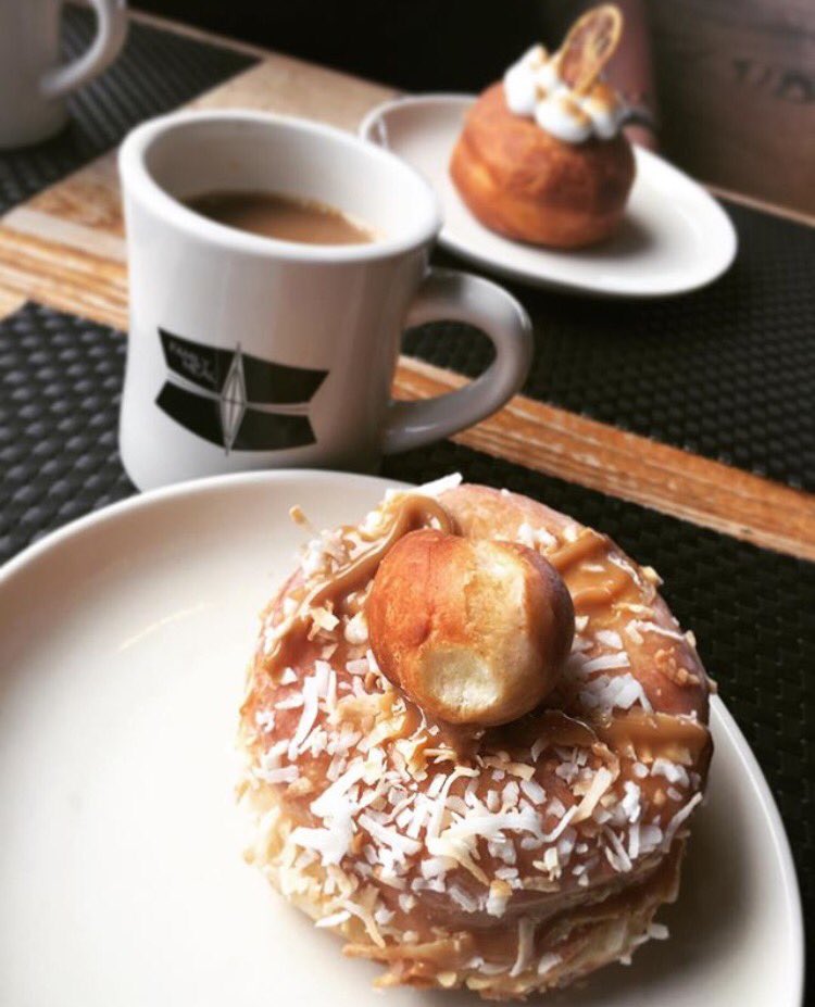 This is how we brunch. #brunch #donut #doughnut #coffee #coconuttresleches #lemon #friends #familymeal #frederickmd