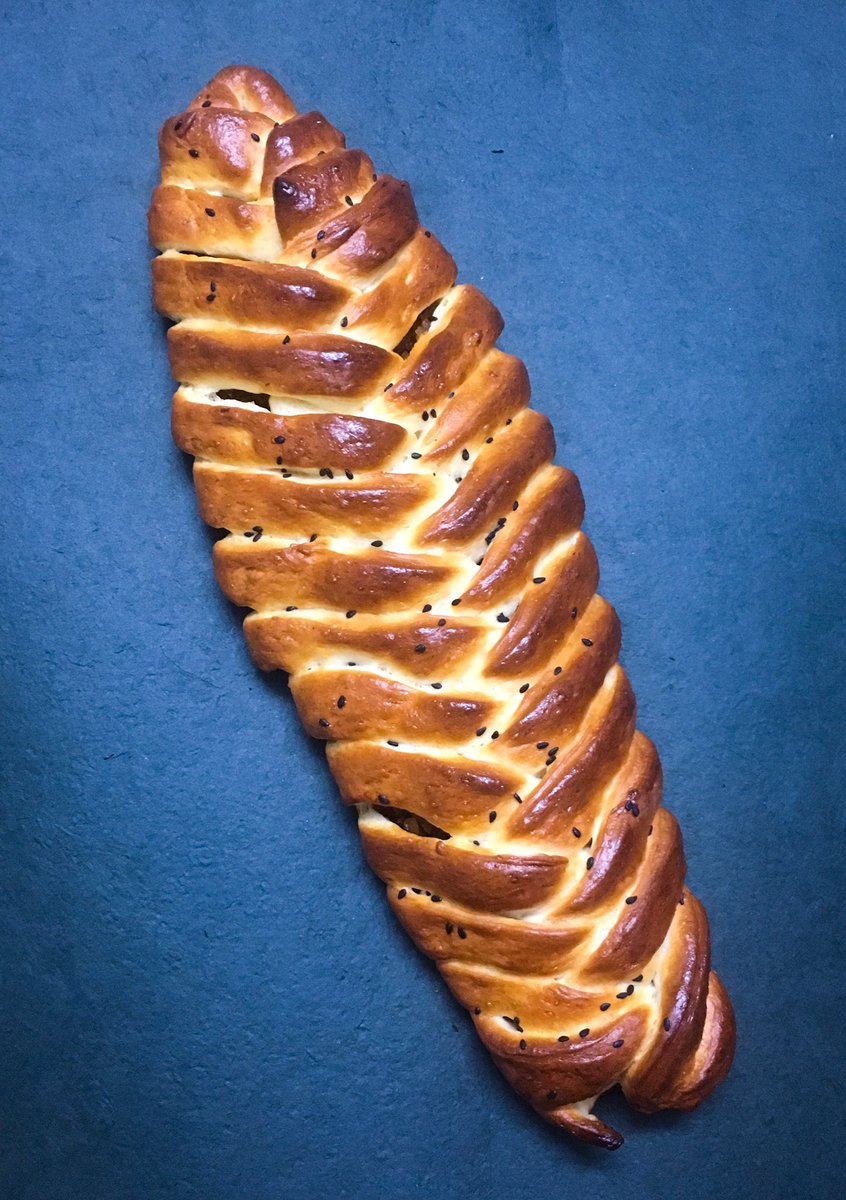 msanusual's tweet photo. Bread baking happened today, you guys. Look at this beauty! Braided zopf with a coconut jaggery filling! https://t.co/gAausvvYLO