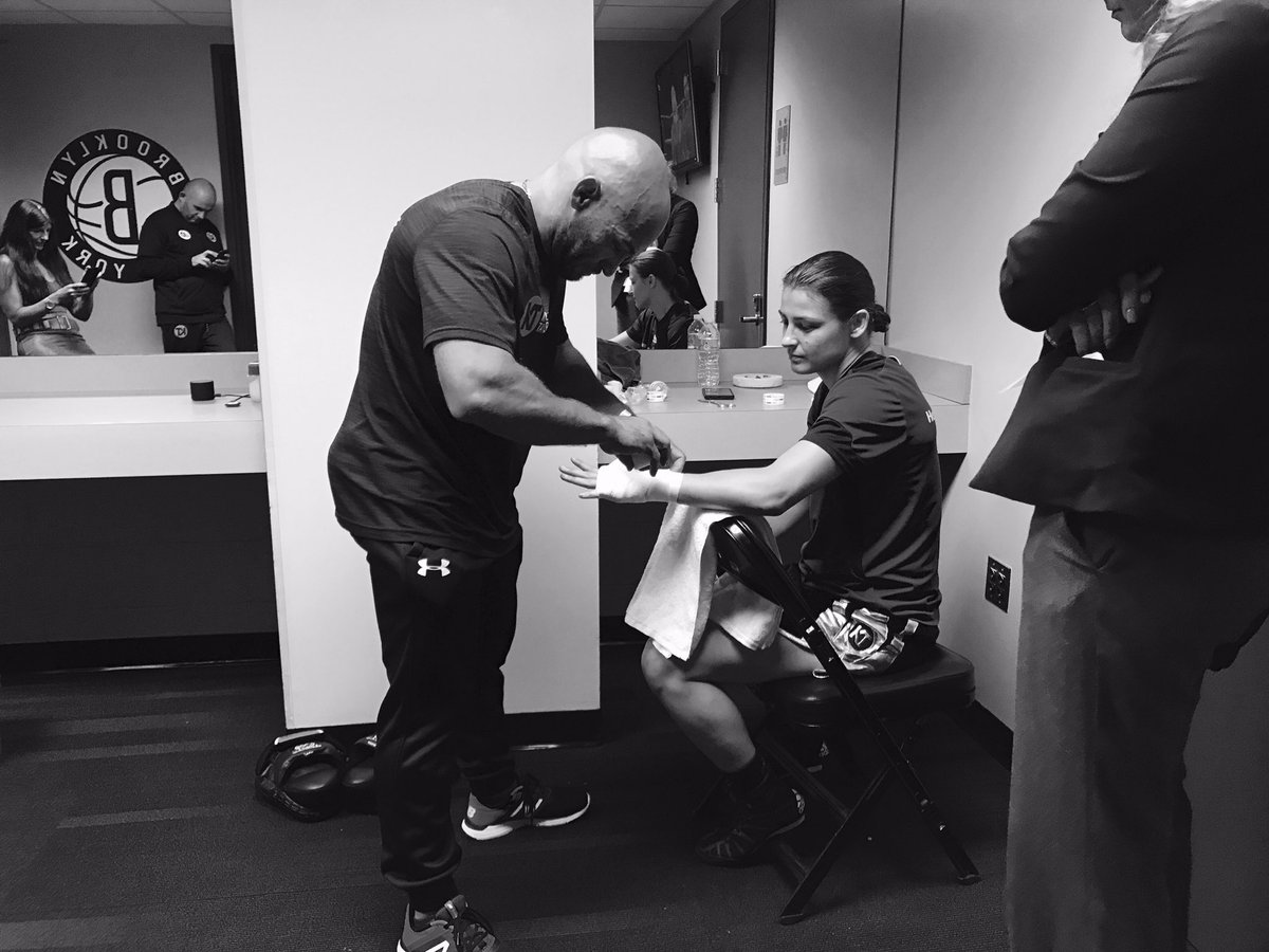 MatchroomBoxing's tweet photo. Hands being wrapped, @KatieTaylor getting ready to dance under the lights! #TaylorClarkson #BronerGarcia https://t.co/Wr0KN8JsJa