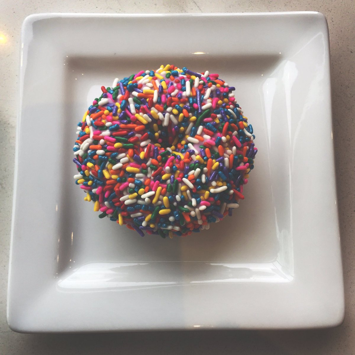 Vanilla birthday cake doughnuts today! Sprinkles inside &amp; out. 👌🏼