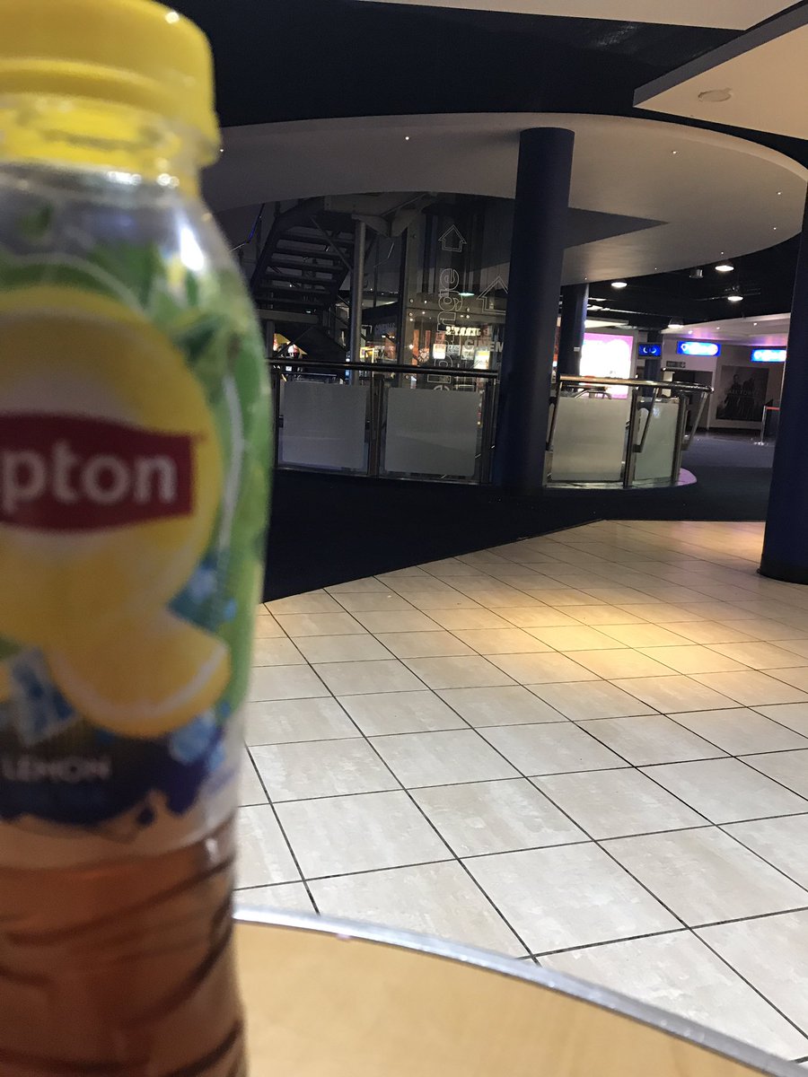 BooksWolf's tweet photo. Hour 5 - Costa is shut so hiding at the cinema hoping they don't kick me out!  #reading #biannualbibliothon #books https://t.co/N2uk1Cft9r