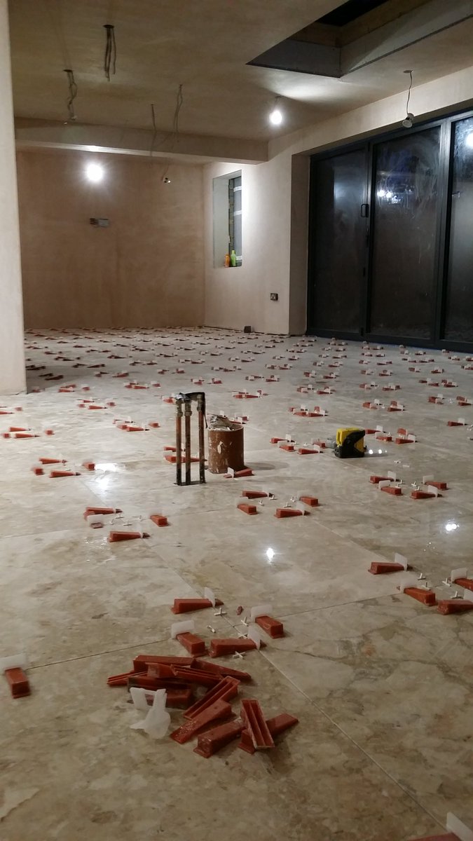 AbbeyTile_Stone's tweet photo. 2 tilers, and 58m2 of marble down today. #PriceWork in South Woodford 😉 https://t.co/qs453kQEwJ