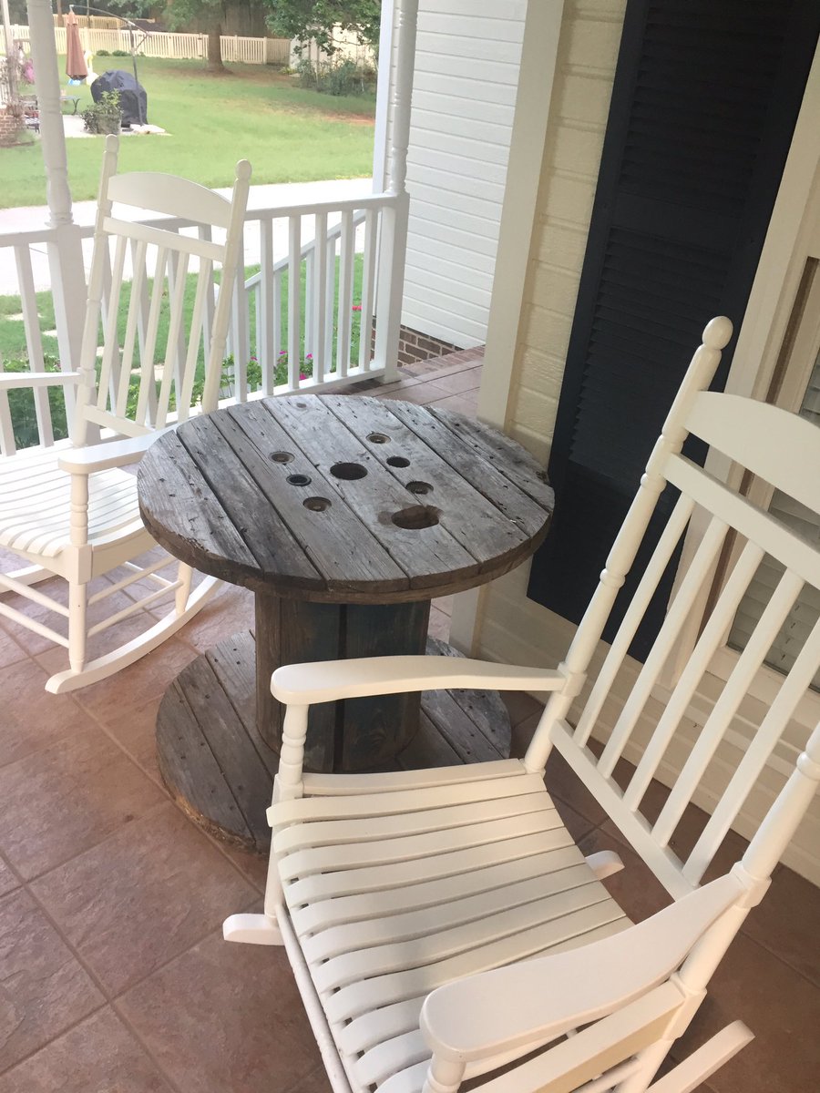 msshirley17's tweet photo. The perfect edition to our front porch. Now I have somewhere to rest my coffee. One man's trash is another man's treasure! #spooltable https://t.co/uVftEJhknQ