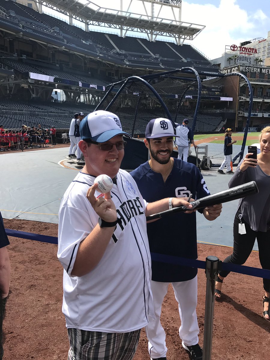 MiracleLeagueSD's tweet photo. AJ is feeling the love from the @Padres and loving this 3-0 lead! Go Padres! Thank you @SonsofBaseball for making this happen! https://t.co/YwNMN0bdTl