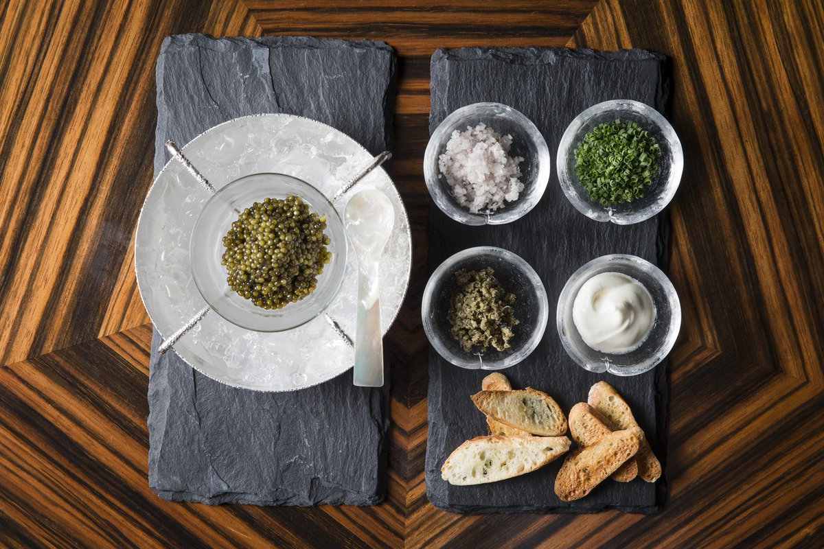 marinabaysands's tweet photo. Treat yourself to this exquisite Oscietra #Caviar and condiments at the #Bar at #WakuGhin! #caviarday @wakughin #explorersoffood https://t.co/Q4q712W49J