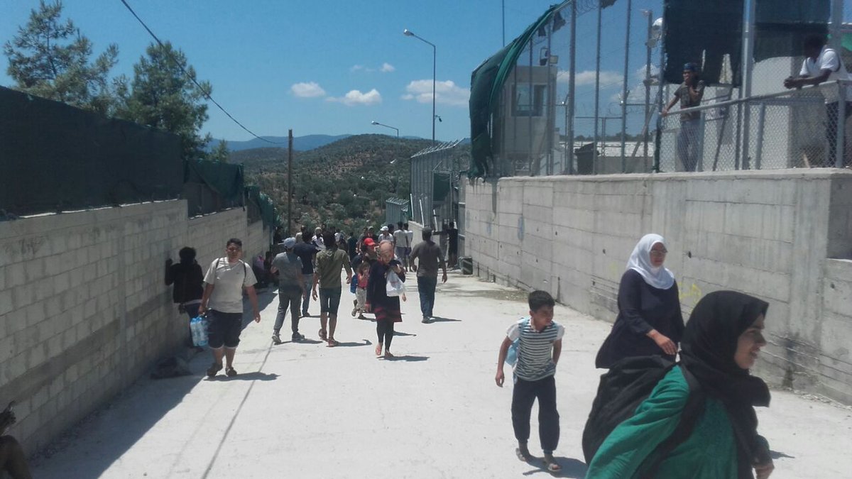 ERCIntl's tweet photo. #BreakingNews : Hundreds of people protest in Moria. Camp currently been evacuated. #ERCIntl on site for assistance. #Moria #Lesvos https://t.co/fpgXvmW6Pl
