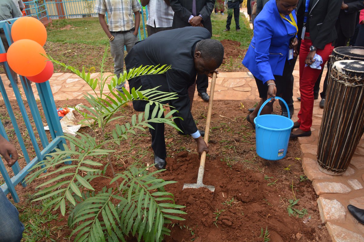 mkurwanda's tweet photo. MKU Vice Chancellor Prof.Stanley Waudo plants a tree during the launch of the students study villas at Mount Kenya University Rwanda. https://t.co/CvpnsGNyDN