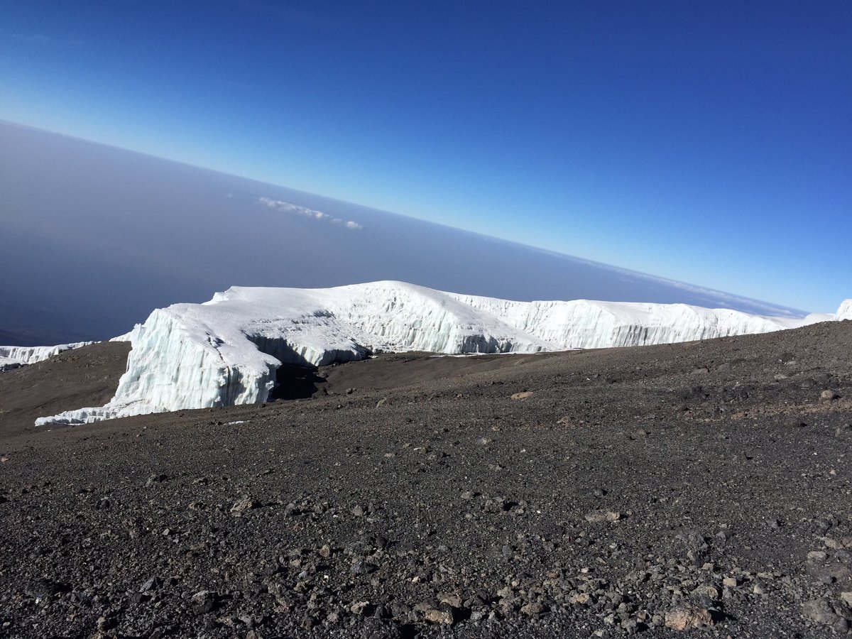 ChallengerBroch's tweet photo. Views of the glaciers and clouds at the top 🗻starting our project phase tomorrow 🇹🇿 https://t.co/aXy6rJOwi0