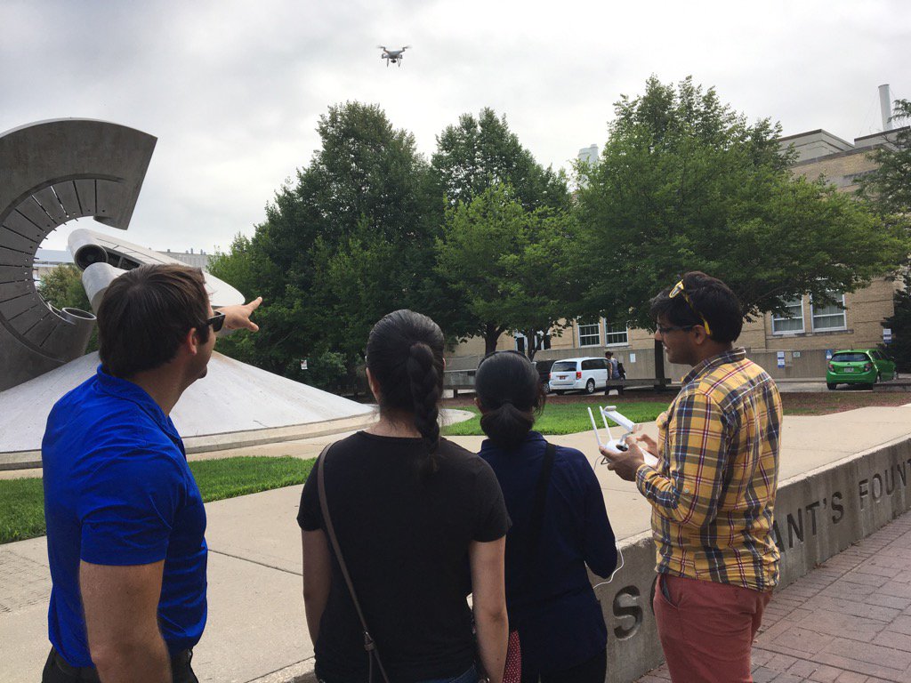 wiscodoug's tweet photo. Instructor Chris Johnson teaches students how to fly a drone in a course offered for the first time this #uwsummer. https://t.co/2ic86pvBKT
