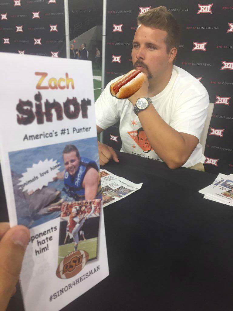 Grillaroni2OSU's tweet photo. Lots of love for our favorite 'RoniHead and the 2018 Heisman Trophy winner @ZachSinor29 #sinor4heisman #Big12MeatiaDays https://t.co/0RCzOETxUq