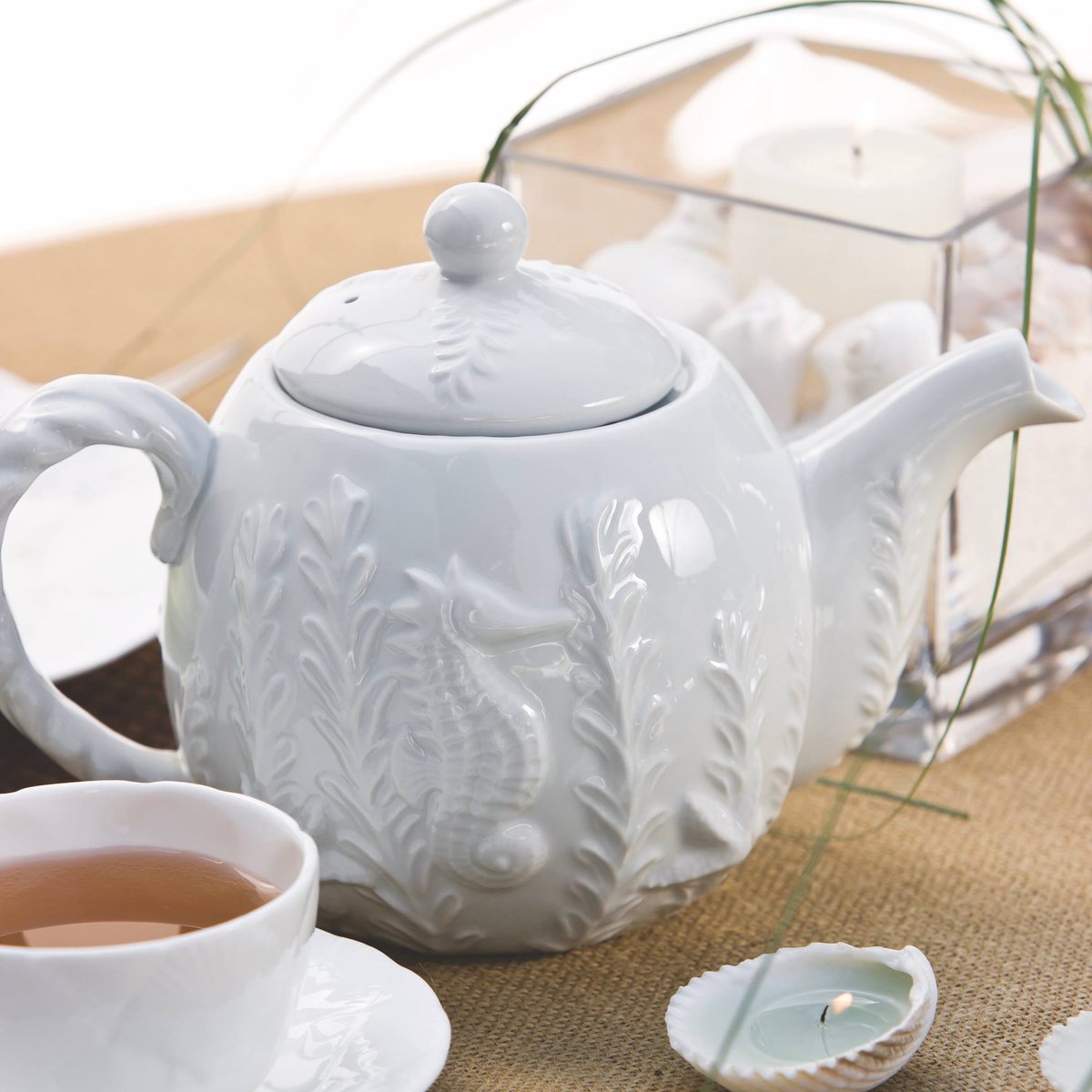 TeaTimeMag's tweet photo. This #TeapotTuesday, we're taking our tea by the sea with this gorgeous Andrea by Sadek "Seahorse" teapot. #AfternoonTea #SummerTea https://t.co/sBpDyrRHG3