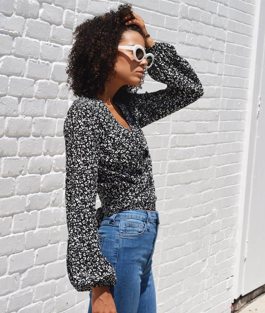 You can still look cool in the heat 😎. Layla wrap blouse by Rolla's, $98.