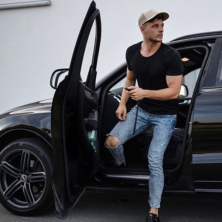 Young Man Poses With His Car. Stock Photo, Picture and Royalty Free Image.  Image 130497369.