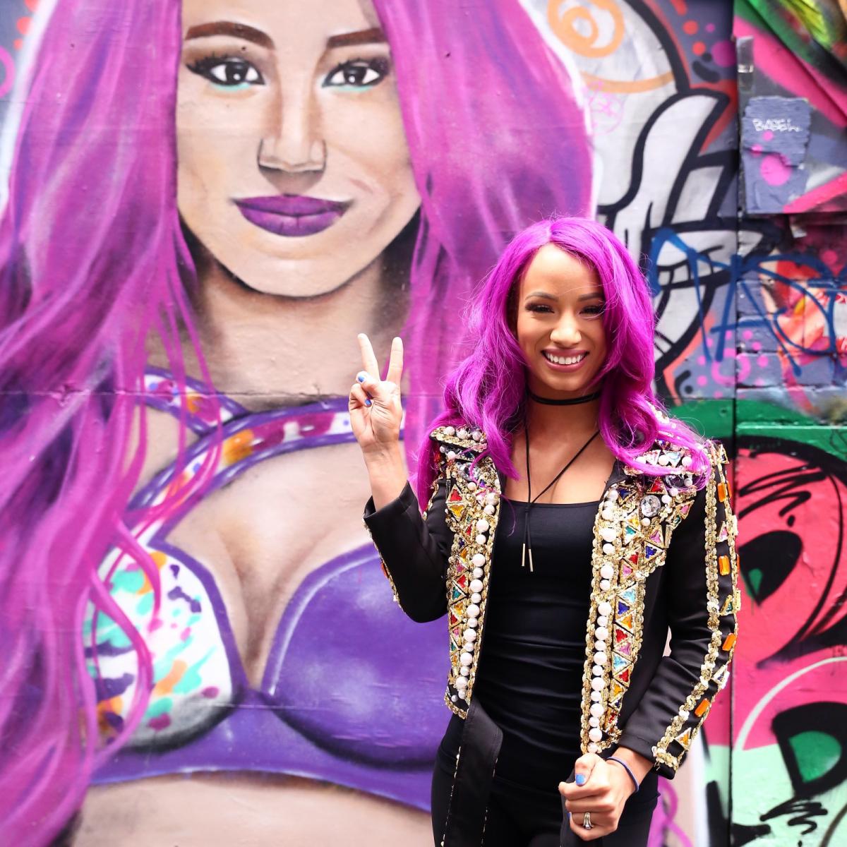 WWEAustralia's tweet photo. Ahead of @WWE LIVE this September, @SashaBanksWWE visited Melbourne. PHOTO GALLERY: https://t.co/aVWEQIdmKu #LegitBossAus #WWEAustralia https://t.co/e4cXaPn8cl