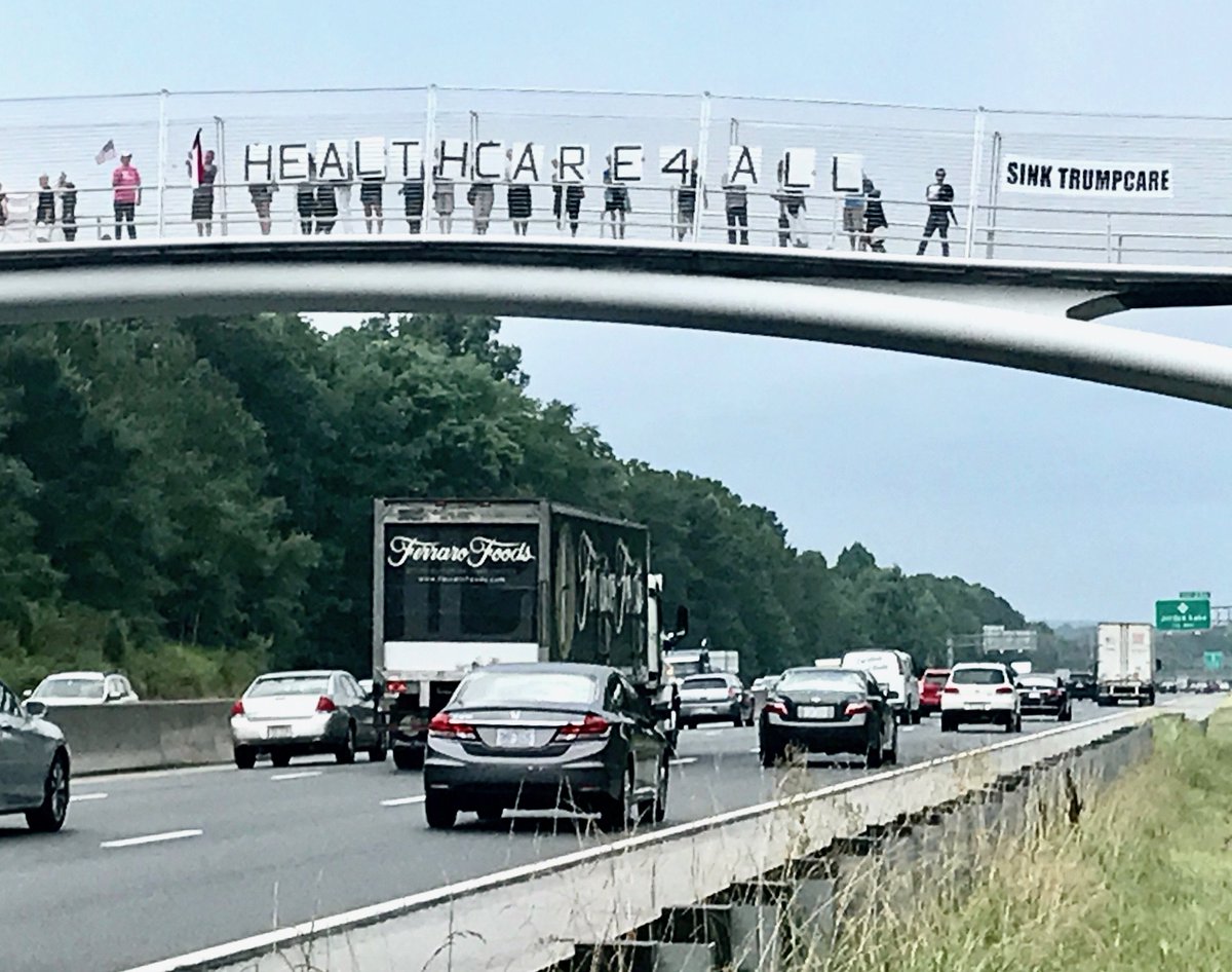 Going on right now: People are protesting the GOP healthcare plan on the American  Tobacco Trail Pedestrian Bridge over I-40 in #Durham