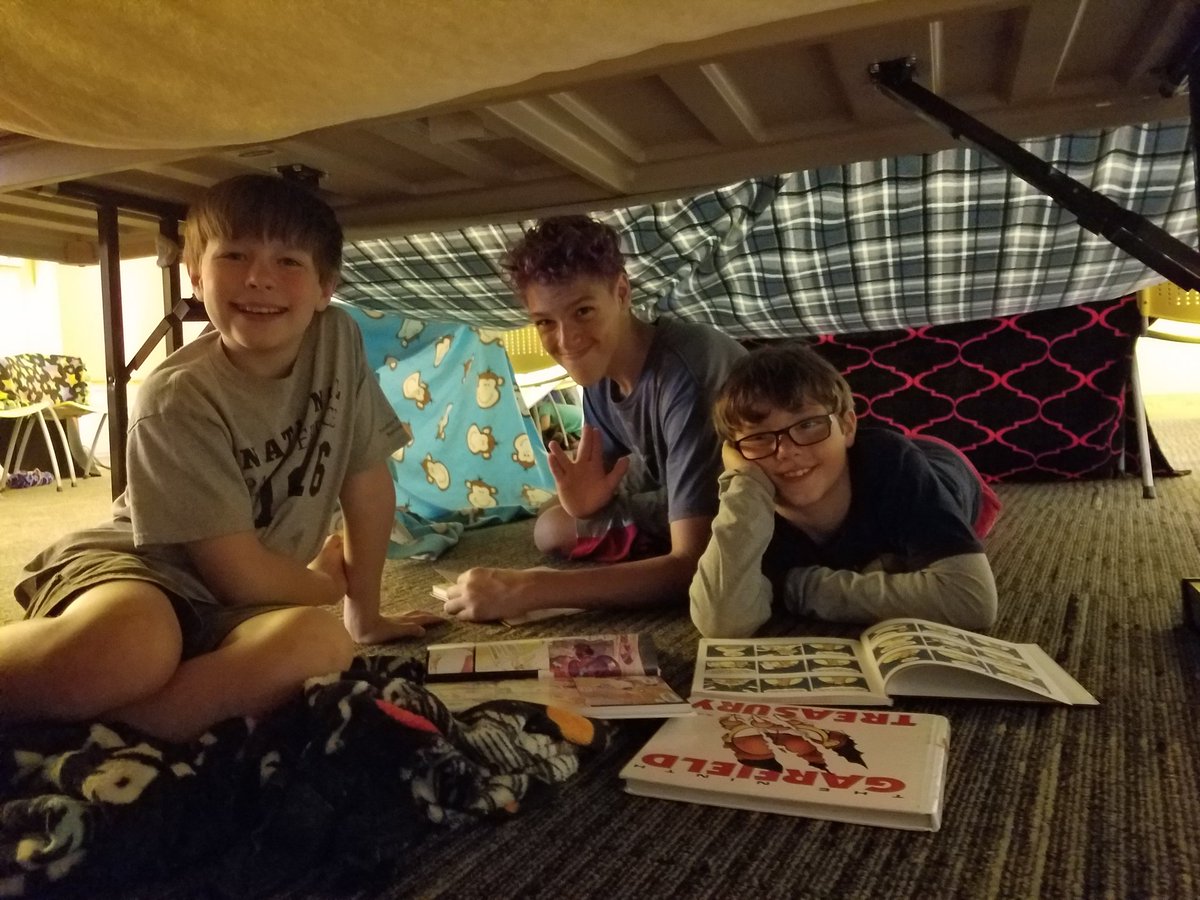 ErinKaye08's tweet photo. This is what "family fort night" at the library looks like. https://t.co/2XYPgEj5Jq