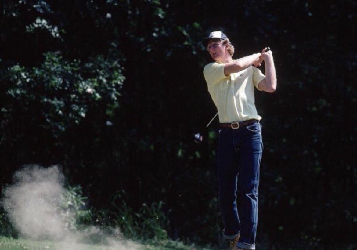 Larry Bird. Playing golf. In blue jeans. Because OF COURSE Larry Bird plays golf in blue jeans. Also, may have caught that a little fat.