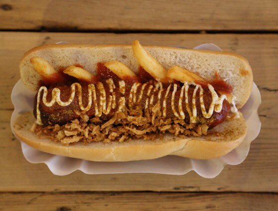 It's #NationalHotDogDay! We're eyeing up this crispy onion and fries monster at <a href="/HermanFeeds/">Herman ze German</a> - or do you like yours more traditional?
