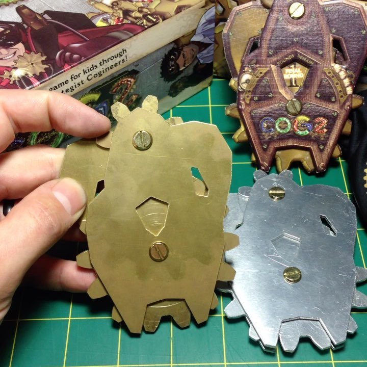 RAEZnet's tweet photo. How awezome is this #COGZ Game Gadget made by @camdotcam from @gamesforpeopleau. Cameron got solid brass and aluminium laser cut and gave m… https://t.co/MNE18HHfnJ