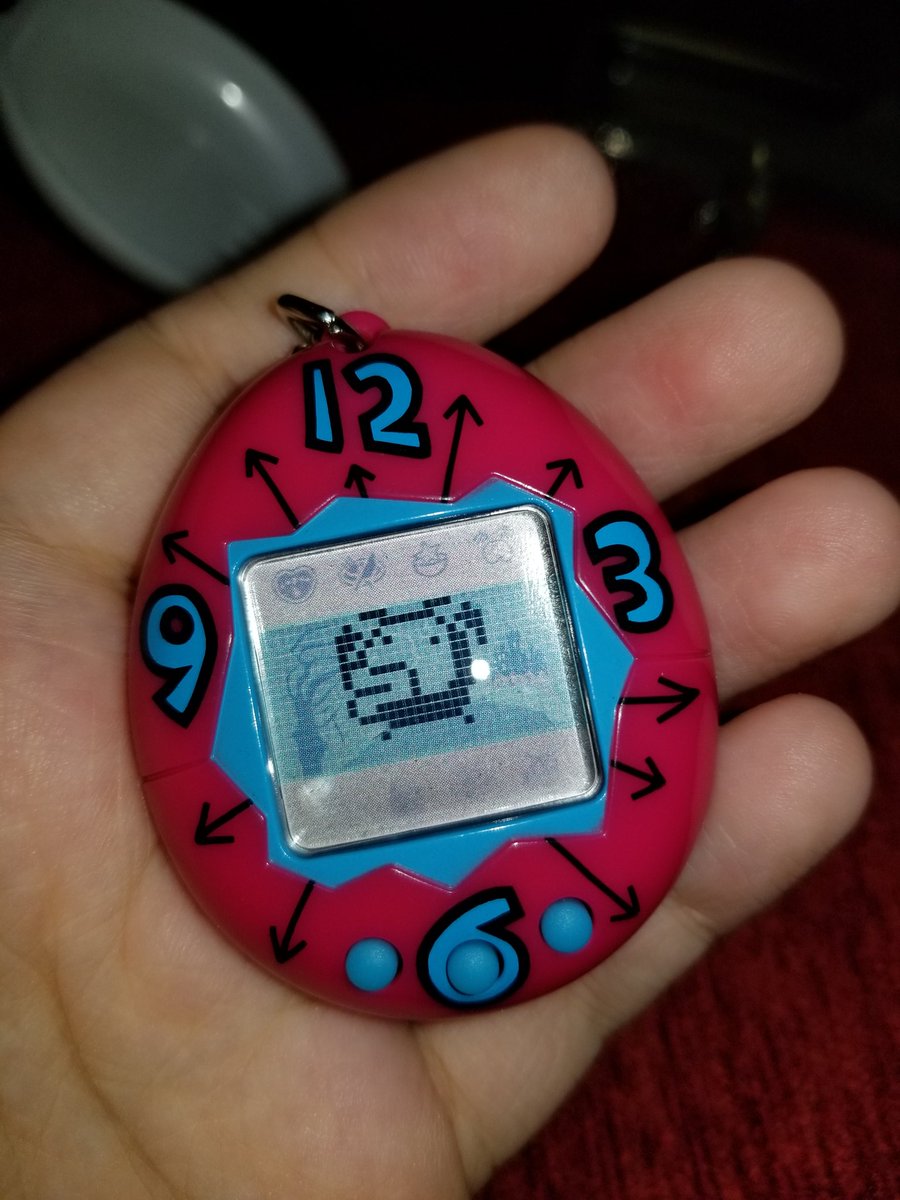 iAm_erica's tweet photo. I went through my old stuff #Devilgotch put into classic #Tamagotchi body. See haunted house and scary tree. https://t.co/f5EuRpsaYo