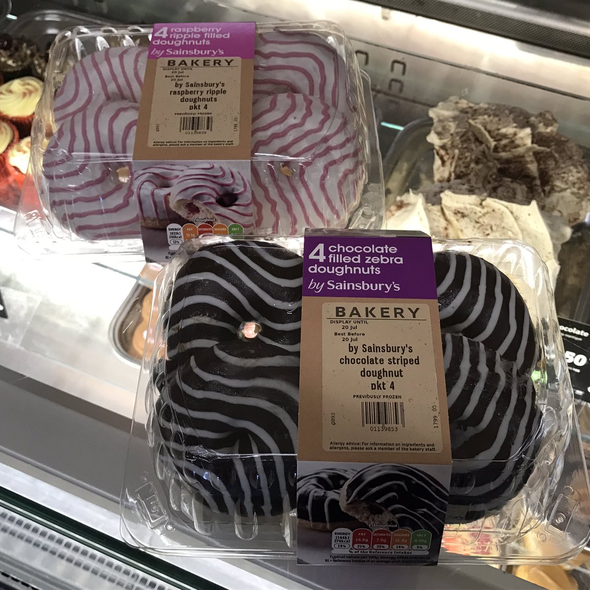 mcgilp_jamie's tweet photo. I can't believe we have these NOW in stock!! Raspberry ripple and choco striped filled doughnuts 🍩😋 #Sainsburys #eastkilbride https://t.co/KH2Z15Uz8V