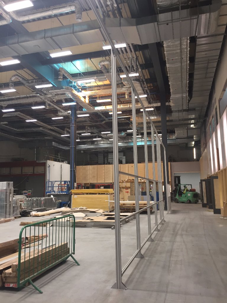 TheBartlettUCL's tweet photo. The security fence is going in around the space where our robots will live in #UCLHereEast #bartlettspace https://t.co/jWSiMkYxht
