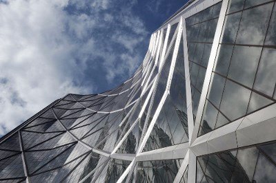 Constructalia's tweet photo. "The Bow" tower's external diagrid structure was optimized with high strength #steel. Wanna know how? #FabricOfLife https://t.co/ctxfLvBUYb https://t.co/jdybhODs0E