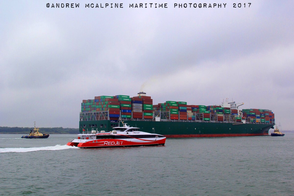 Maritimegeek's tweet photo. @RedFunnel #RedJet6 passes an inbound boxship with @Svitzer1833 tugs assisting. Everyday life on #Southampton water #portlife #ABPics https://t.co/Z81UxMGGUS