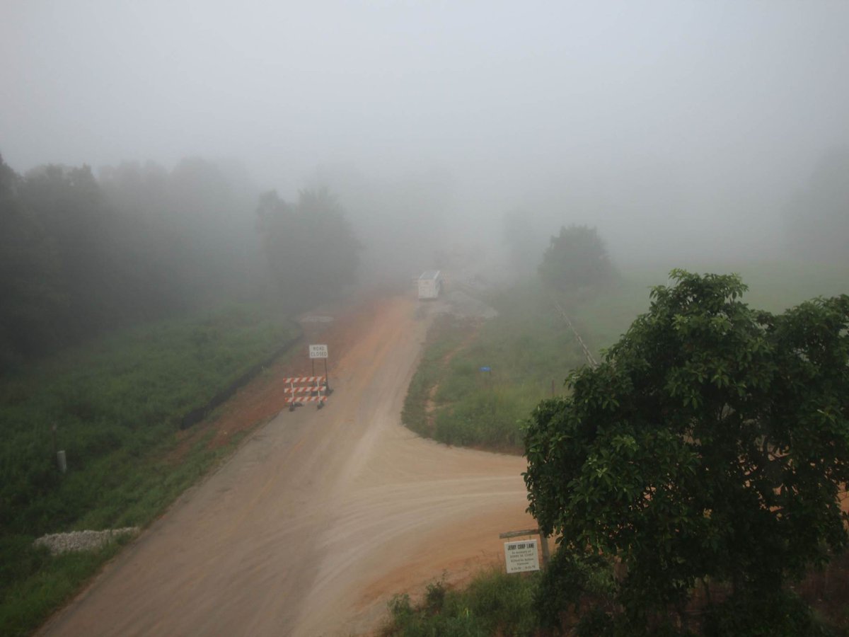 MoDOTSoutheast's tweet photo. Foggy morning prevents views of continued progress on Route PP in Ozark County this morning. #useyourlights #MoRecovery https://t.co/vI1SpGLOKw
