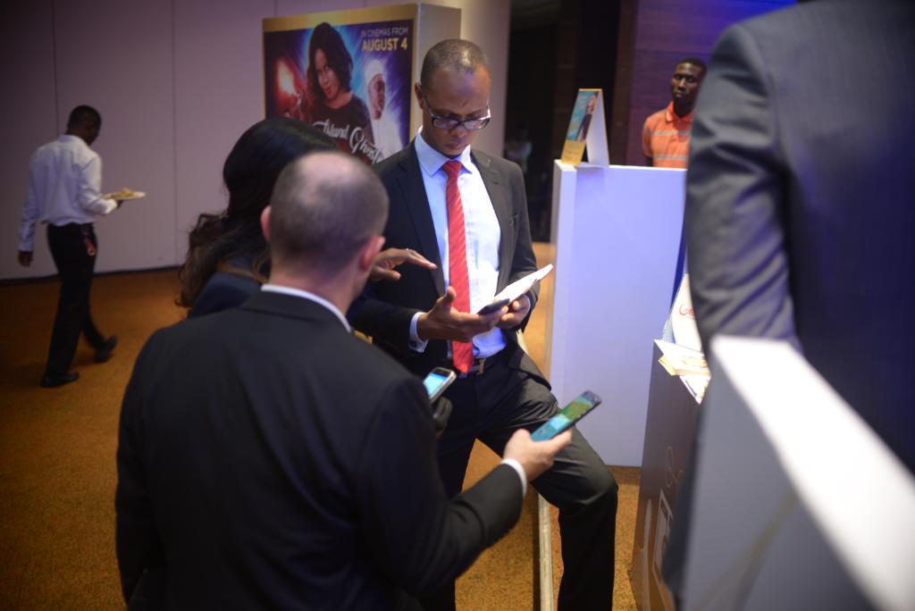 VisaNigeria's tweet photo. Here we have our guests using mVisa for the first time at the merchant area. #paywithmVisa #TheNewWayToPay #mVisa https://t.co/399rr2kEld