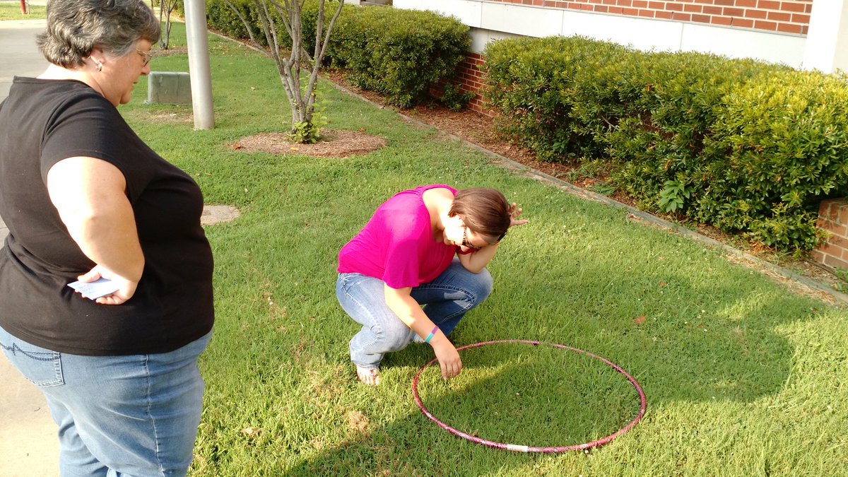 JustonLamb's tweet photo. Using hulahoops to count weed population. #girlpower #growwithasp #atucase2017 @LucasDMaxwell @FarmCreditWEAR https://t.co/YTMXGoMOVj
