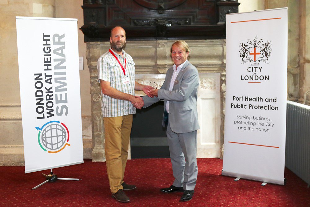 IWAHSeminar's tweet photo. Peter Bennett, MD of PASMA receiving his memento from Jonathan Capper, IRATA Intl Executive Member. #LWAHS #PASMA #CityofLondonCorporation https://t.co/uPMLsUUTeb