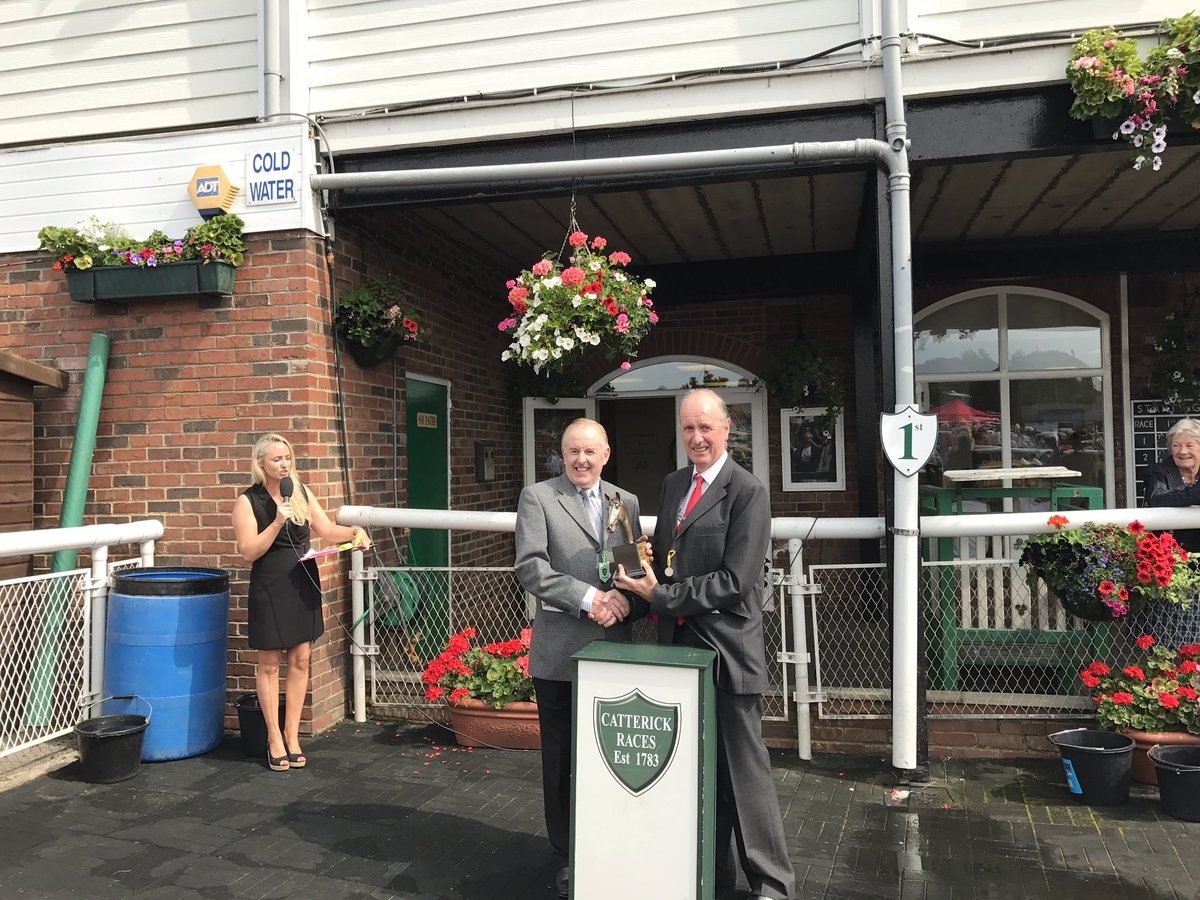 DawnGoodfellow's tweet photo. Alan Tippling receiving his @Racingwelfare #LifetimeinRacing award @CatterickRaces from Chris Thornton, his employer for 31 years https://t.co/8nMECIZfGA