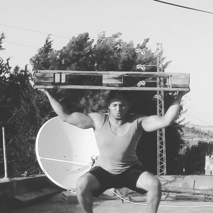 Weighted squat@strength day@strong fitness
