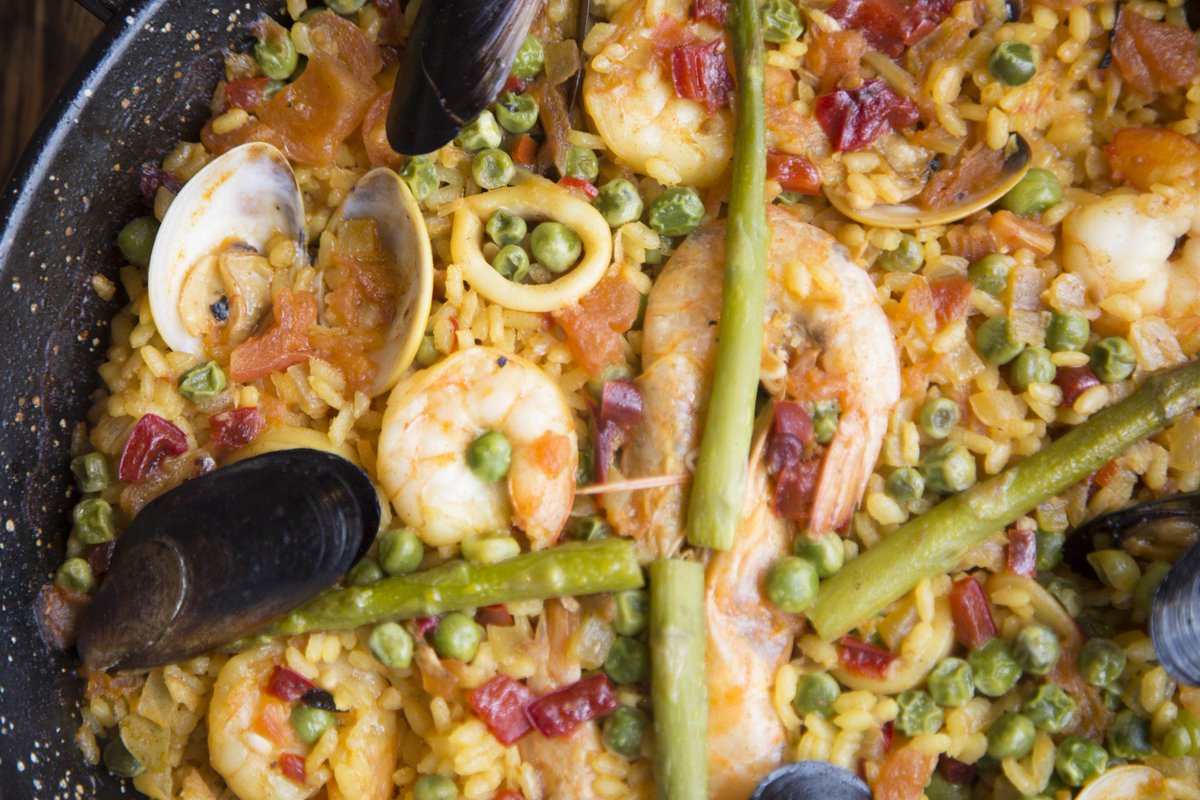 LizarranAmerica's tweet photo. Sample the flavors of the sea at Lizarran America. Arroz del Mediterráneo: spanish rice with squids, clams, prawns, mussels, and saffron. https://t.co/LpUaW4xN5F