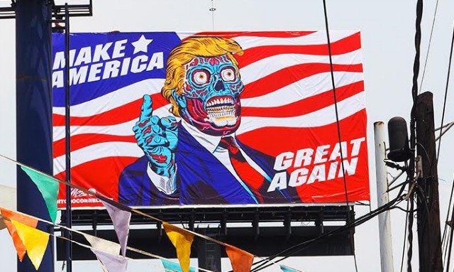 Chicagoist's tweet photo. The Trump/'They Live' Billboard Is Up, Right Where Trump Is Least Popular https://t.co/TG8iKHRSIc https://t.co/wdMrufvwBs