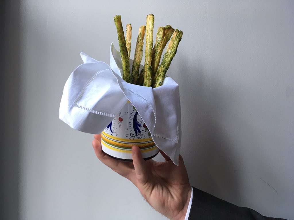 <a href="/DelPosto/">Del Posto</a> Staff from <a href="/DelPosto/">Del Posto</a> are also hand models #SaveurSuppers. Garlic, parmesan &amp; basil grissinis 👌🏻