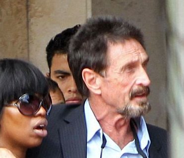 officialmcafee's tweet photo. Need help identifying man over my shoulder https://t.co/zQgBJyFigB