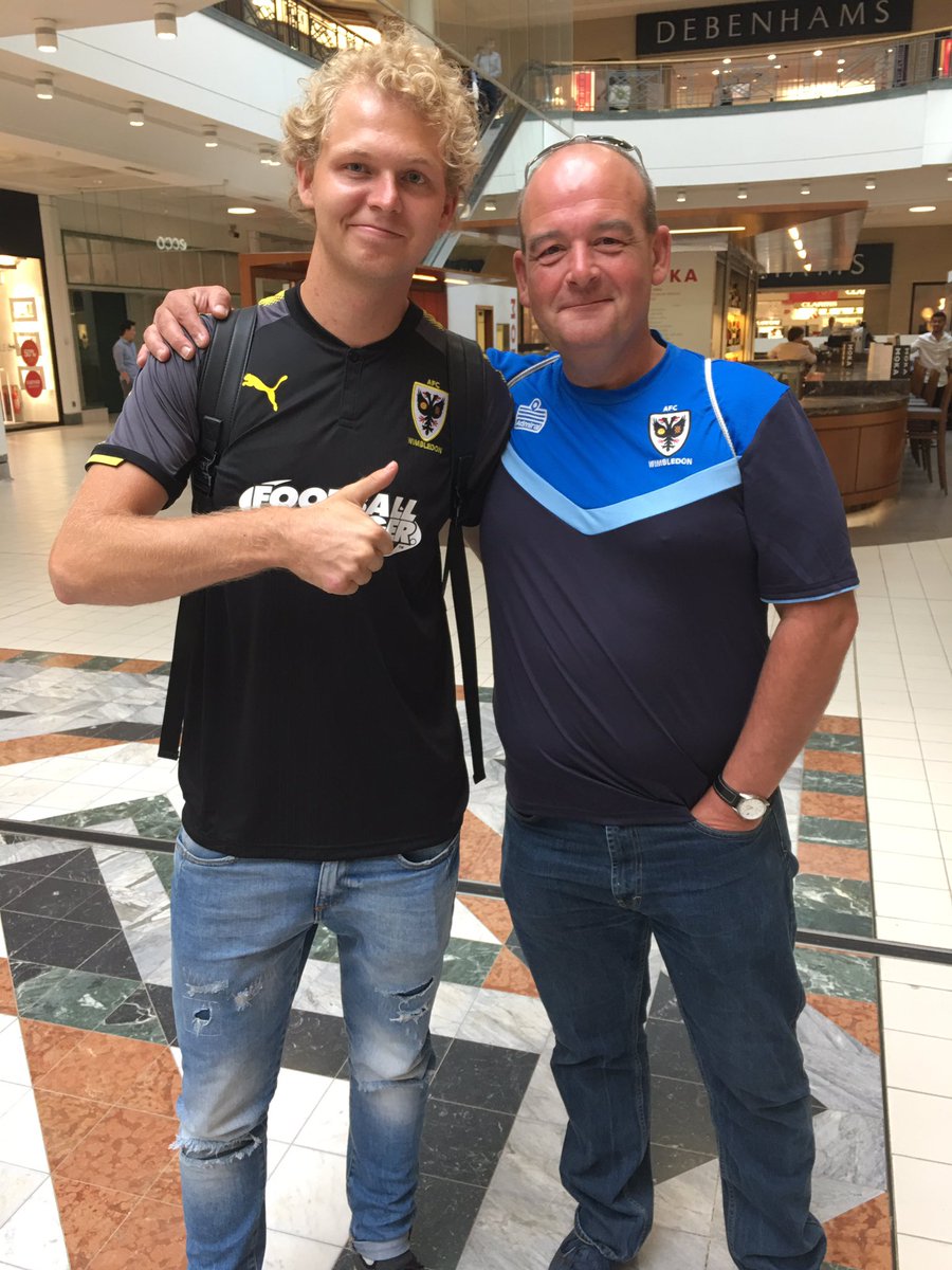 AFCWimbledon's tweet photo. These lucky Dons fans each won 2 match tickets for tomorrow's pre-season friendly against The Brewers! Congratulations! #goodscouting 😉🕵️ https://t.co/LHfpvOICh4